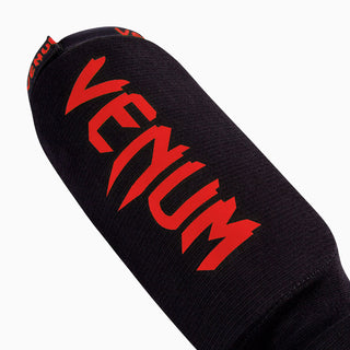 Protège-tibias avec protège-pieds à chaussette Venum Kontact 