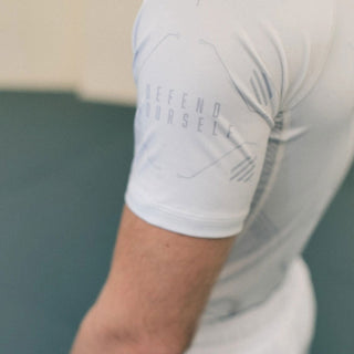 Rashguard Manto Shield manches courtes Blanc-Combat Arena